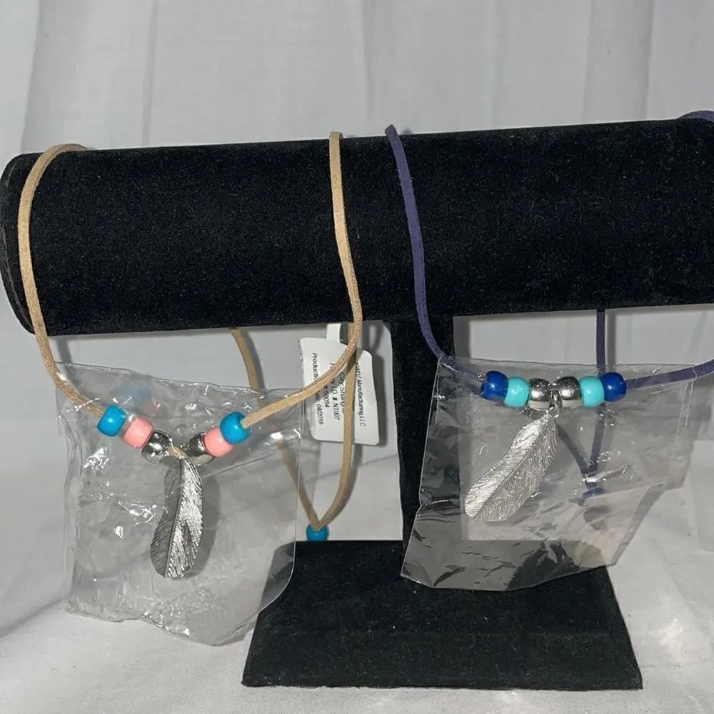 Two feather necklaces 